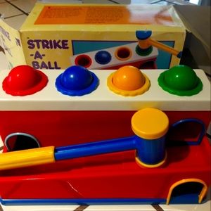 Discovery Toys Strike-A-Ball Vintage Toy